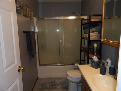 Well-maintained property featuring a 14' RV carport with hookups - photo 22