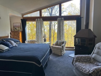 Tucked in the woods- it's like your own private treehouse! This