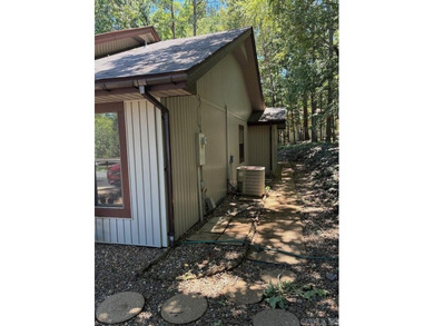 Great Location! This unique single level end unit townhome has - photo 2