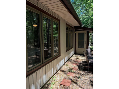 Great Location! This unique single level end unit townhome has - photo 4