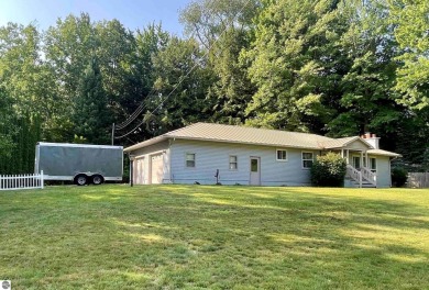 Lake Mitchell Home For Sale in Cadillac Michigan