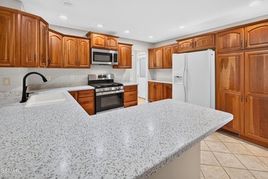 Nestled on a full acre in the desirable Indian Shores community - photo 12