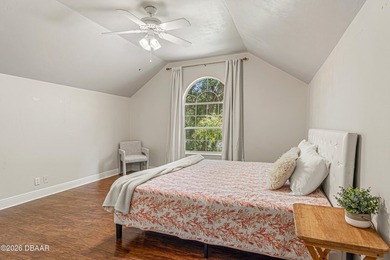 Tucked away on over an acre of beautifully wooded privacy, this - photo 4