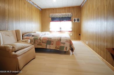 Country home nestled on 4.48 acres, features a pond and ample - photo 12