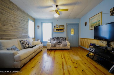 Country home nestled on 4.48 acres, features a pond and ample - photo 17