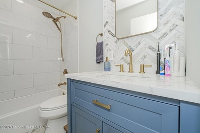 Welcome to 72 Gold Avenue! This gorgeous 18ft-wide, 3-bedroom - photo 24