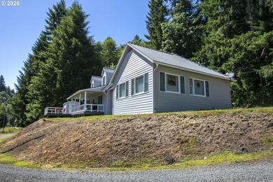 Two homes on over 7 riverfront acres! The 1983 home is 3 bedroom - photo 29
