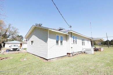 Country home nestled on 4.48 acres, features a pond and ample - photo 31