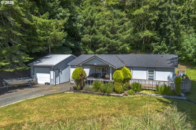 Two homes on over 7 riverfront acres! The 1983 home is 3 bedroom - photo 34
