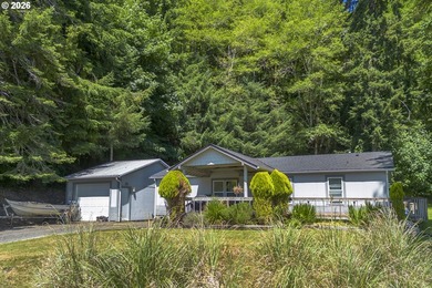 Two homes on over 7 riverfront acres! The 1983 home is 3 bedroom - photo 35