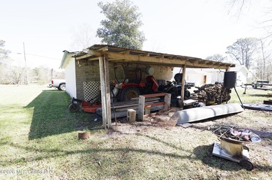 Country home nestled on 4.48 acres, features a pond and ample - photo 36