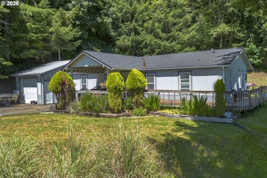 Two homes on over 7 riverfront acres! The 1983 home is 3 bedroom - photo 36