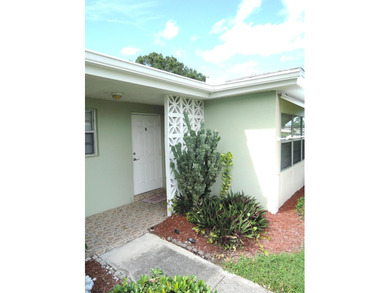 Beautifully maintained end condo in this gated senior complex - photo 2