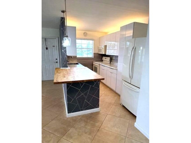 Beautifully maintained end condo in this gated senior complex - photo 6