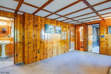Welcome to this adorable year round ranch-style lake home! Upon - photo 11