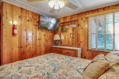 Welcome to this adorable year round ranch-style lake home! Upon - photo 14