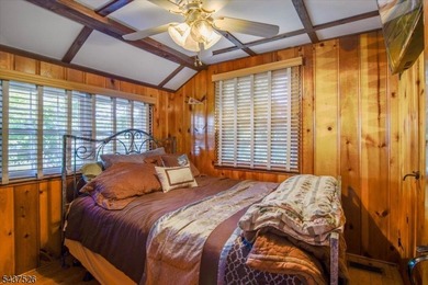Welcome to this adorable year round ranch-style lake home! Upon - photo 15