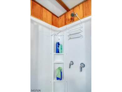 Welcome to this adorable year round ranch-style lake home! Upon - photo 19