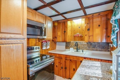 Welcome to this adorable year round ranch-style lake home! Upon - photo 22
