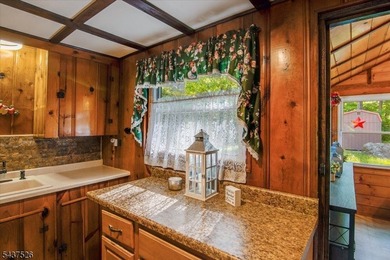 Welcome to this adorable year round ranch-style lake home! Upon - photo 23