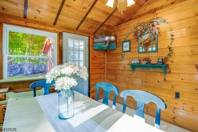 Welcome to this adorable year round ranch-style lake home! Upon - photo 27
