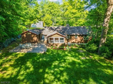 Welcome to this adorable year round ranch-style lake home! Upon - photo 31