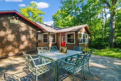 Welcome to this adorable year round ranch-style lake home! Upon - photo 33