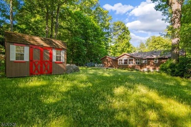 Welcome to this adorable year round ranch-style lake home! Upon - photo 36