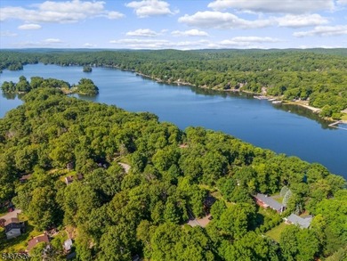 Welcome to this adorable year round ranch-style lake home! Upon - photo 40