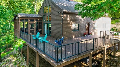 Enjoy year-round lake living from this original Yankee Barn post - photo 1