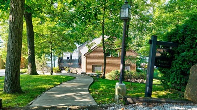 Enjoy year-round lake living from this original Yankee Barn post - photo 2