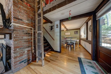 Enjoy year-round lake living from this original Yankee Barn post - photo 8