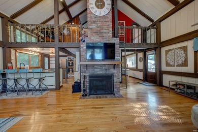 Enjoy year-round lake living from this original Yankee Barn post - photo 9