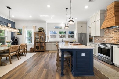 This coastal custom home is set on a protected bayou with serene - photo 13