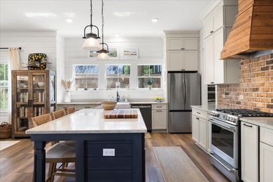 This coastal custom home is set on a protected bayou with serene - photo 14