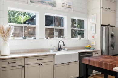 This coastal custom home is set on a protected bayou with serene - photo 16