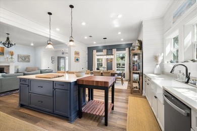 This coastal custom home is set on a protected bayou with serene - photo 20