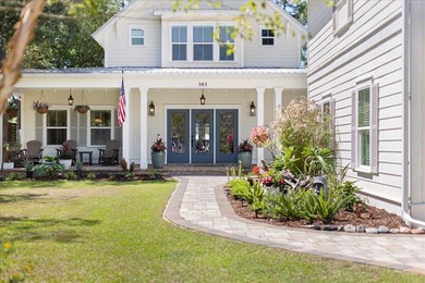 This coastal custom home is set on a protected bayou with serene - photo 31