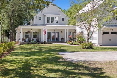 This coastal custom home is set on a protected bayou with serene - photo 32