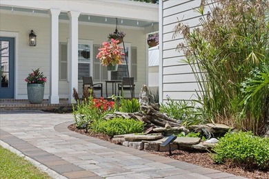 This coastal custom home is set on a protected bayou with serene - photo 33