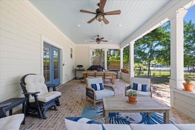 This coastal custom home is set on a protected bayou with serene - photo 40