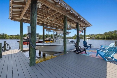 This coastal custom home is set on a protected bayou with serene - photo 43