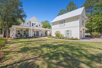 This coastal custom home is set on a protected bayou with serene - photo 45