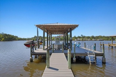This coastal custom home is set on a protected bayou with serene - photo 48