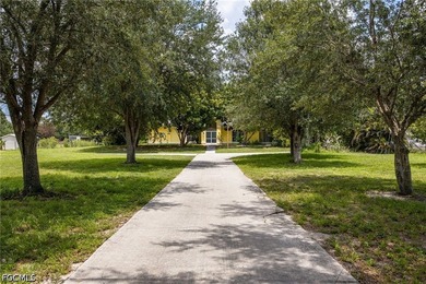 Nestled on over 2.5 private acres in Fort Myers, this spacious - photo 3