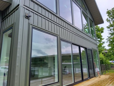 Lakefront living at its best is now complete in this beautifully - photo 2