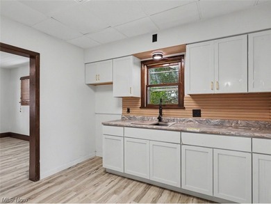 Welcome to this beautifully remodeled Colonial in the heart of - photo 6