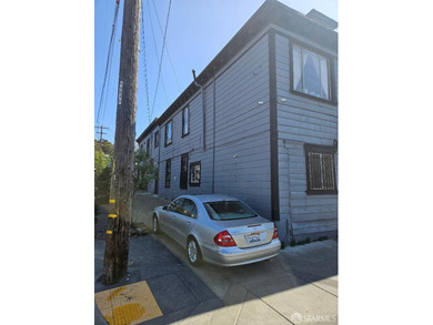 Sunny location a few blocks from the bay. In need of repairs per - photo 2