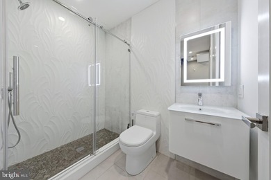 Welcome to this beautifully maintained, 10-year-young townhouse - photo 8