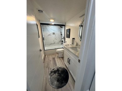 This top-of-the-line designer decorated 2-bedroom-plus-den - photo 28